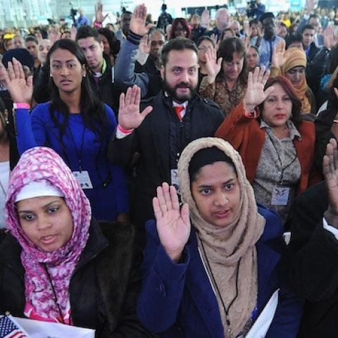 Candidates for U.S. Citizenship are sworn in during the Naturalization Ceremony at Festival PEOPLE En Espanol 2015 presented by Verizon at Jacob Javitz Center on October 18, 2015 in New York City. (Brad Barket/Getty Images for PEOPLE En Espanol)
