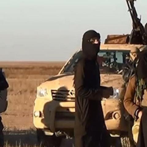 Screenshot from a propaganda video uploaded on June 11 by the Islamic State allegedly shows militants driving at an undisclosed location in Iraq's Nineveh province.