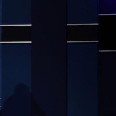 Republican nominee Donald Trump (L) speaks as Democratic nominee Hillary Clinton gestures on during the first presidential debate at Hofstra University in Hempstead, New York on September 26, 2016. (JEWEL SAMAD/AFP/Getty Images)