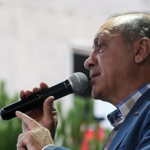 Turkish President Recep Tayyip Erdogan addresses citizens outside his residence at Kisikli Neighborhood following the failed coup attempt, in Istanbul, Turkey on July 16, 2016. (Elif Ozturk/Anadolu Agency/Getty Images)