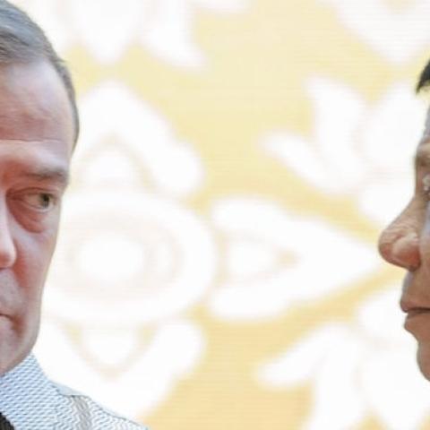 Russian Prime Minister Dmitry Medvedev (L) chats with Philippine President Rodrigo Duterte at the Association of Southeast Asian Nations (ASEAN) Summit in Vientiane on September 7, 2016. (YE AUNG THU/AFP/Getty Images)