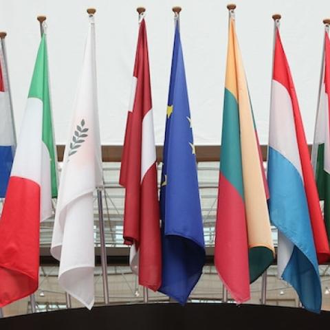 Flags of the European Union member states hang inside the Council of the European Union's Lex building on February 18, 2016 in Brussels, Belgium. (Dan Kitwood/Getty Images)