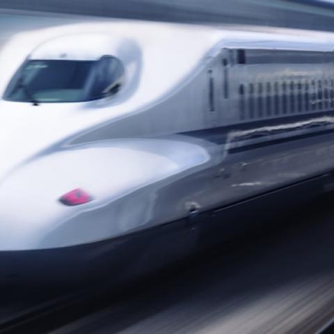 Shinkansen high-speed bullet train N700 series Nozomi passing a platform, Shizuoka, Japan. (Oleksiy Maksymenko/Getty Images)
