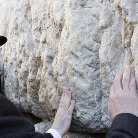 Chinese Foreign Minister Wang Yi visits the Western Wall, Judaism's holiest prayer site, in Jerusalem's Old City on December 20, 2013. (AHMAD GHARABLI/AFP/Getty Images)