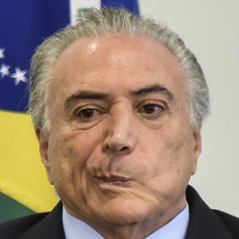 President of Brazil Michel Temer attends technical cooperation agreement signing ceremony with the Court Superior Electoral (TSE) at Planalto Palace in Brasilia, Brazil on October 11, 2016. (Ricardo Botelho/Brazil Photo Press/LatinContent/Getty Images)