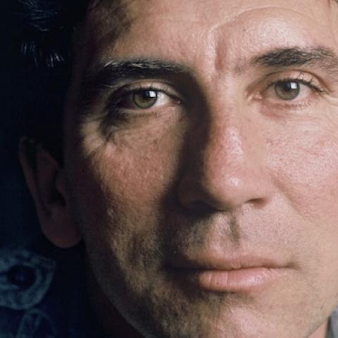 Reinaldo Arenas poses while at home in Paris, France during June of 1988. (Ulf Andersen/Getty Images)