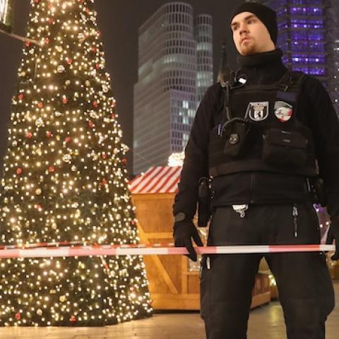 Police stand at the area after a lorry truck ploughed through a Christmas market on December 19, 2016 in Berlin, Germany. (Sean Gallup/Getty Images)