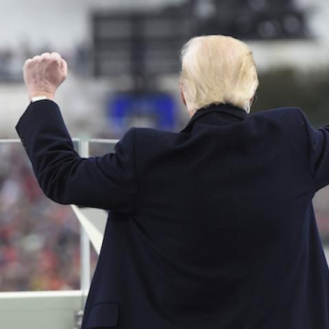US President Donald Trump celebrates after his speech during the Presidential Inauguration at the US Capitol on January 20, 2017 in Washington, DC. (Saul Loeb - Pool/Getty Images)