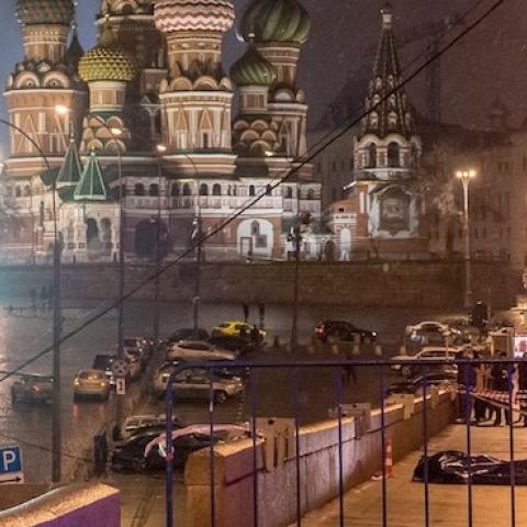 The body of killed Russian opposition leader and former Deputy Prime Minister Boris Nemtsov, covered by plastic, seen on Bolshoi Moskvoretsky bridge near St. Basil cathedral, Moscow, Russia, February 28, 2015. (Stringer/Anadolu Agency/Getty Images)