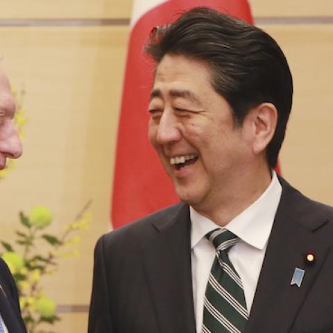 US Defense Secretary James Mattis (L) and Japanese Prime Minister Shinzo Abe (R) shake hands at the prime minister's office in Tokyo on February 3, 2017. (EUGENE HOSHIKO/AFP/Getty Images)