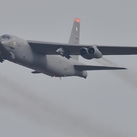 A US B-52 Stratofortress (R) is escorted by a South Korean F-15K fighter jet (L) as it flies over the Osan Air Base in Pyeongtaek, south of Seoul, on January 10, 2016. (JUNG YEON-JE/AFP/Getty Images)