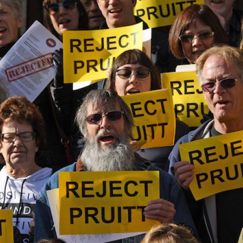 Activists gather outside Sen. Michael Bennet's office in Denver to oppose President Trump's nominee for EPA Administrator, Oklahoma Attorney General Scott Pruitt, January 23, 2017. (RJ Sangosti/The Denver Post via Getty Images)
