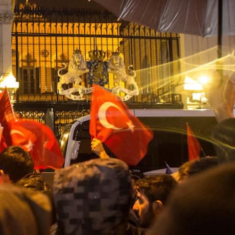 Protesters sing songs and chant slogans outside the Dutch Consulate on March 12, 2017 in Istanbul, Turkey. (Chris McGrath/Getty Images)