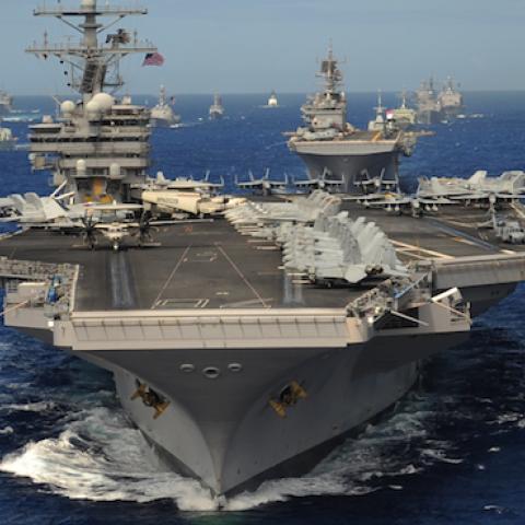 The Nimitz-class aircraft carrier USS Ronald Reagan (CVN 76) leads a mass formation of ships through the Pacific Ocean July 24, 2010, during Rim of the Pacific (RIMPAC) 2010. (Mass Communication Specialist 1st Class Scott Taylor, U.S. Navy/Released)