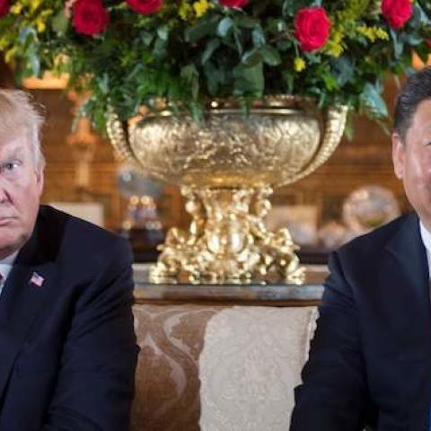 US President Donald Trump (L) sits with Chinese President Xi Jinping (R) during a bilateral meeting at the Mar-a-Lago estate in West Palm Beach, Florida, on April 6, 2017. (JIM WATSON/AFP/Getty Images)