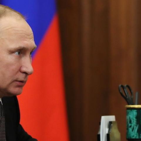Russia's president Vladimir Putin during a meeting with his envoy to the Volga Federal District, Alexander Yevstifeyev (not in picture) in the Kremlin. (Mikhail Klimentyev\TASS via Getty Images)