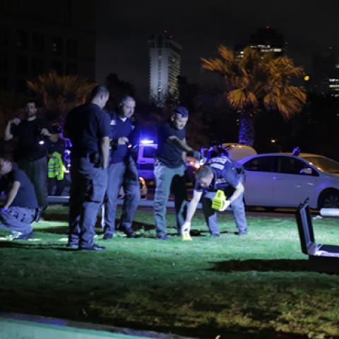 Israeli security forces inspect the scene of the Jaffa attack that claimed the life of Taylor Force, March 08, 2016 (Daniel Bar On/Anadolu Agency/Getty Images)