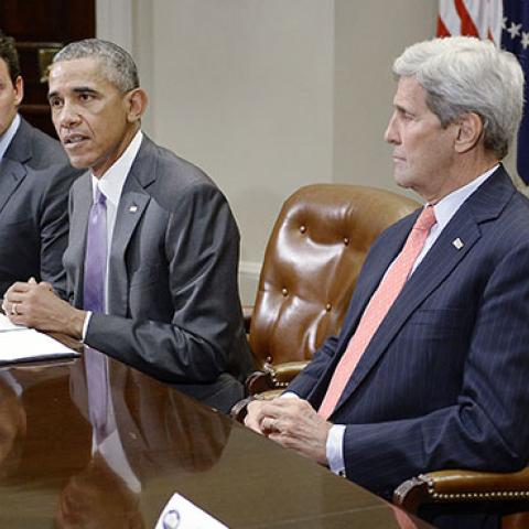 U.S President Barack Obama and Secretary of State John Kerry meet with a small group of veterans and Gold Star Mothers to discuss the Iran nuclear deal, September 10, 2015 (Olivier Douliery-Pool/Getty Images)