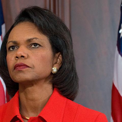US Secretary of State Condoleezza Rice listens as US President George W. Bush speaks prior to signing HR 7222, Washington, DC, October 16, 2008 (SAUL LOEB/AFP/Getty Images)