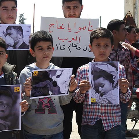 Survivors of chemical gas attack gather to protest Assad regime at the Khan Shaykhun town's square in Idlib, Syria, April 7, 2017 (Firas Faham/Anadolu Agency/Getty Images)