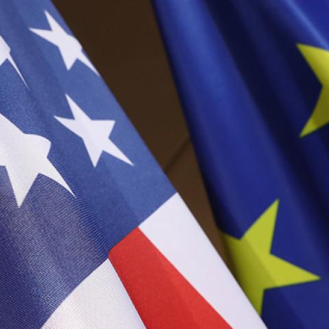 The U.S. and E.U. flags hang at the W20 conference on April 25, 2017 in Berlin, Germany (Sean Gallup/Getty Images)