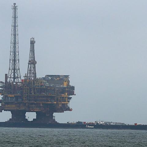 Shell's Brent Delta Topside offshore oil drilling rig platform is towed by tug boats along the coastline of Hartlepool, May 2, 2017 (SCOTT HEPPELL/AFP/Getty Images)