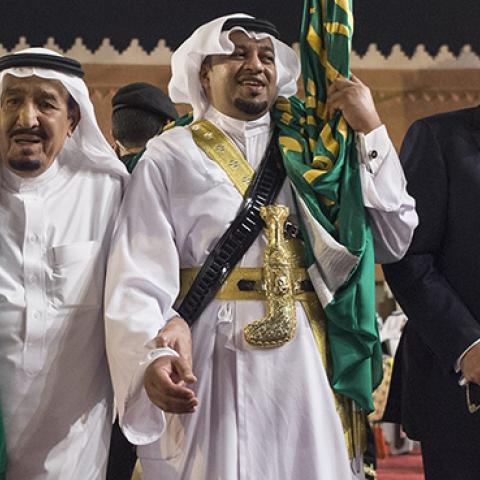 Saudi Arabia's King Salman bin Abdulaziz Al Saud and U.S. President Donald Trump join dancers with swords at Murabba Palace in Riyadh, Saudi Arabia, May 20, 2017 (Bandar Algaloud / Saudi Royal Council / Handout/Anadolu Agency/Getty Images)
