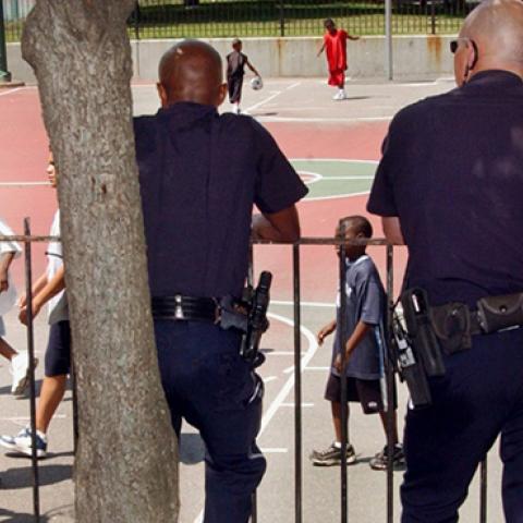 Municipal Police Officers patrol Ramsay Park in Boston, Massachusetts, August 5, 2004 (John Nordell/The Christian Science Monitor via Getty Images)