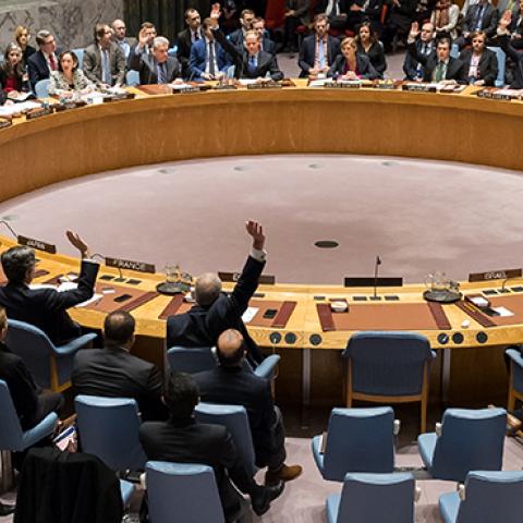 Fourteen members of the Security Council raise their hands in affirmation of Resolution 2334, December 23, 2016 (Albin Lohr-Jones/Pacific Press/LightRocket via Getty Images)