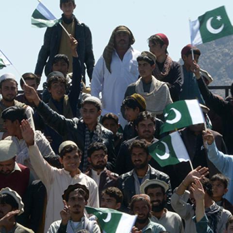Pakistani tribesmen carry national flag during a Pakistan National Day in North Waziristan, March 23, 2017 (ABDUL MAJEED/AFP/Getty Images)