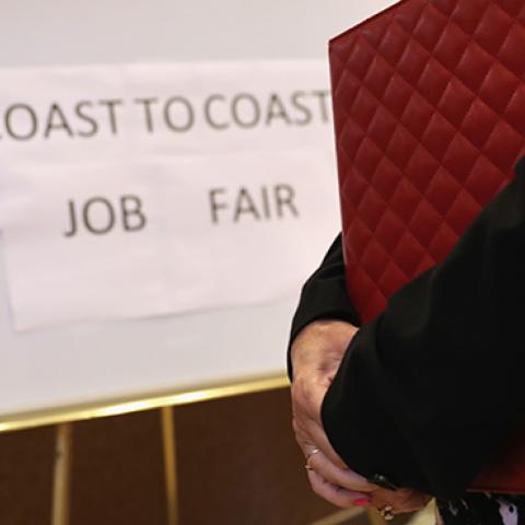 A woman waits to meet potential employers at a job fair on September 13, 2016 in Hartford, Connecticut (John Moore/Getty Images)