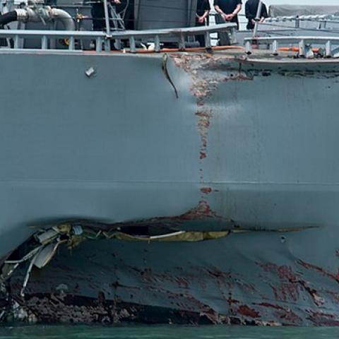 Collision damage to the portside of the USS John S. McCain (DDG 56), August 21, 2017 (U.S. Navy)