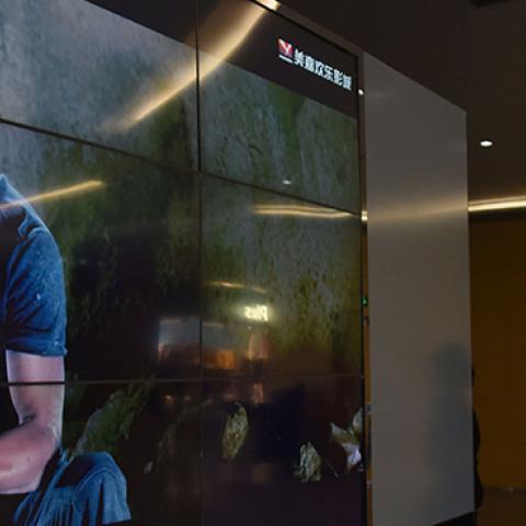 Screen at Beijing movie theater showing scenes from Wolf Warrior II, August 21, 2017 (GREG BAKER/AFP/Getty Images)