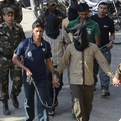 SIMI operatives led to court in Bhopal, India, May 13, 2014 (Praveen Bajpai/Hindustan Times via Getty Images)