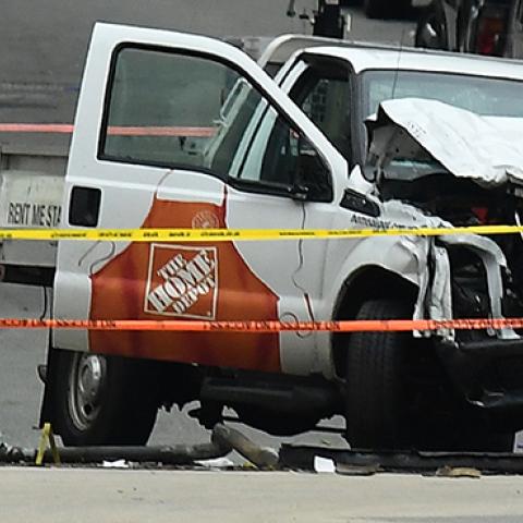 Investigators work around the wreckage of a Home Depot pickup truck a day after it was used in a terror attack in New York, November 1, 2017 (JEWEL SAMAD/AFP/Getty Images)