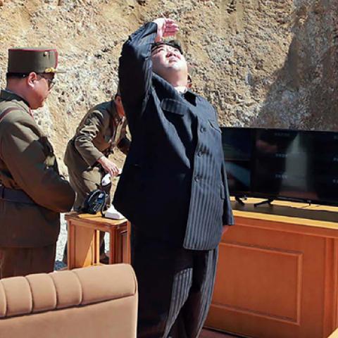 North Korean leader Kim Jong-Un inspecting the successful test-fire of the intercontinental ballistic missile Hwasong-14 (STR/AFP/Getty Images)