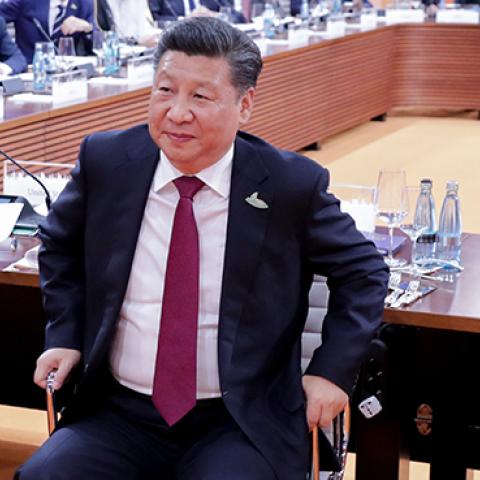 U.S. President Trump, Chinese President Jinping, and German Chancellor Merkel at the G20 meeting in Hamburg, July 7, 2017 (PHILIPPE WOJAZER/AFP/Getty Images)