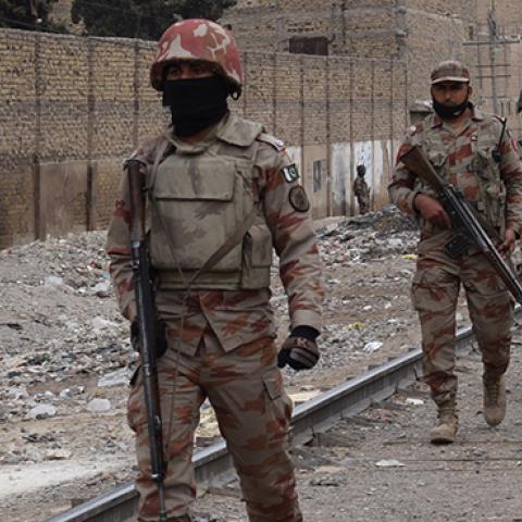 Pakistani paramilitary soldiers patrol near the site of an attack by gunmen on policemen in Quetta, February 14, 2018 (BANARAS KHAN/AFP/Getty Images)
