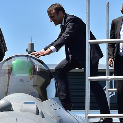 President Macron boards a Dassault Rafale fighter jet at the International Paris Air Show, June 19, 2017 (CHRISTOPHE ARCHAMBAULT/AFP/Getty Images)
