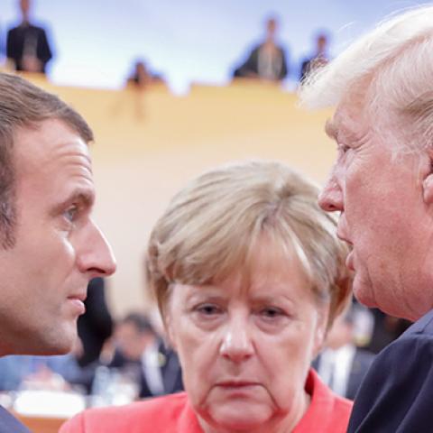 President Trump, Chancellor Merkel, and President Macron at the G20 meeting in Hamburg, July 7, 2017 (KAY NIETFELD/Getty Images)
