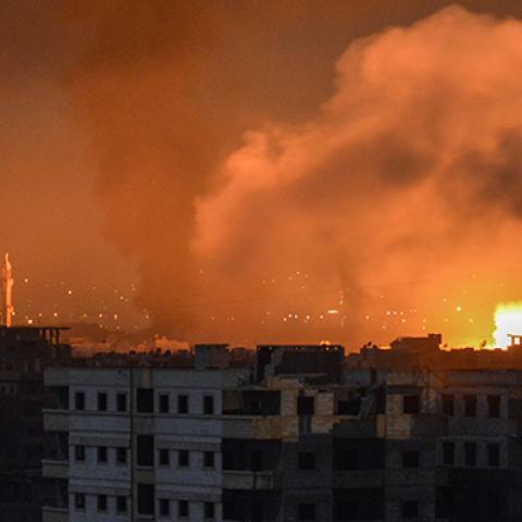 April 28, 2018 explosions appearing in the skyline of a southern district of the Syrian capital Damascus, during regime strikes targeting the Islamic State group in the Palestinian camp of Yarmuk, and neighbouring districts.
