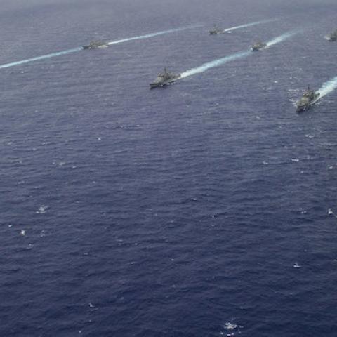 Ships from the George Washington and Carl Vinson Carrier Strike Groups steam in formation at the conclusion of Valiant Shield 2014. (U.S. Navy/Mass Communication Specialist 3rd Class Paolo Bayas/Released)