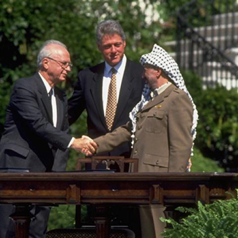 Yitzak Rabin and Yassir Arafat shake hands after signing the peace accord between Israel and the PLO at the White House, September 13, 1993 (Richard T. Nowitz/CORBIS/Corbis via Getty Images)
