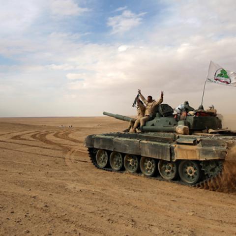 Tank flying the flag of Asa'ib Ahl al-Haq, November 25, 2017 (AHMAD AL-RUBAYE/AFP/Getty Images)