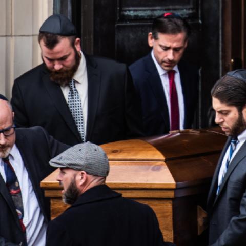 The caskets of brothers David Rosenthal and Cecil Rosenthal who were killed at the mass shooting at the Tree of Life Synagogue are carried out of the Rodef Shalom Synagogue on Tuesday, October 30, 2018, in Pittsburgh, PA. (Photo by Salwan Georges/The Wash