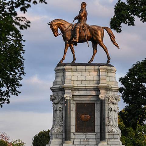 A statue of Confederate General Robert E. Lee along Monument Avenue in Richmond, VA. (Photo by Salwan Georges/The Washington Post via Getty Images)