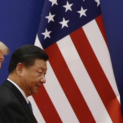 U.S. President Donald Trump and China's President Xi Jinping meet business leaders at the Great Hall of the People on November 9, 2017 in Beijing, China. (Photo by Thomas Peter-Pool/Getty Images)