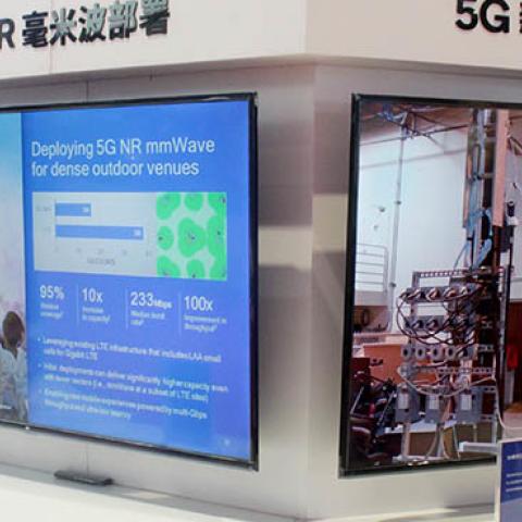 People visit the booth of 5G communication technology during the China International Import Expo (CIIE) at the National Exhibition and Convention Center on November 7, 2018 in Shanghai, China. (Photo by Wang Qiming/VCG via Getty Images)