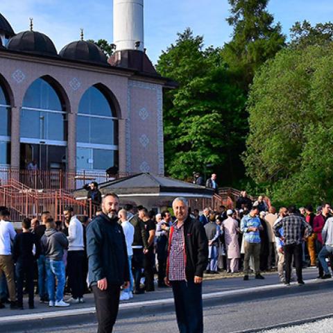 People arrive to perform Eid al-Fitr prayer in Stockholm, Sweden on June 15, 2018. (Photo by Atila Altuntas/Anadolu Agency/Getty Images)