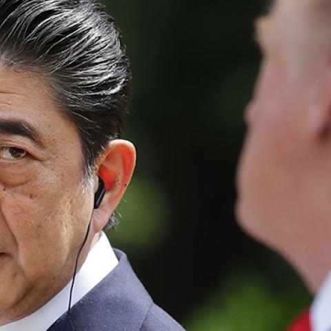Japanese Prime Minister Shinzo Abe looks at U.S. President Donald Trump at a joint news conference in the Rose Garden at the White House June 7, 2018 in Washington, DC. (Chip Somodevilla/Getty Images)